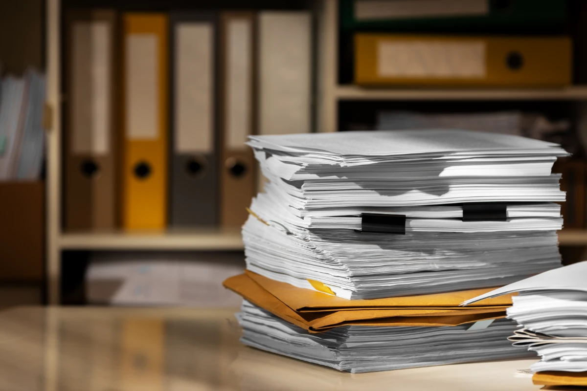 Important Documents stacked Vertically on a table